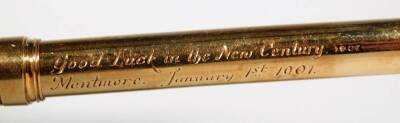 A 18ct gold propelling pencil, by Garrard & Co, of cylindrical form with ring top and inner pencil, part engraved Good Luck In The New Century Mentmore January 1st 1901, marked 18ct, the case 8cm W, 13g all in. - 2