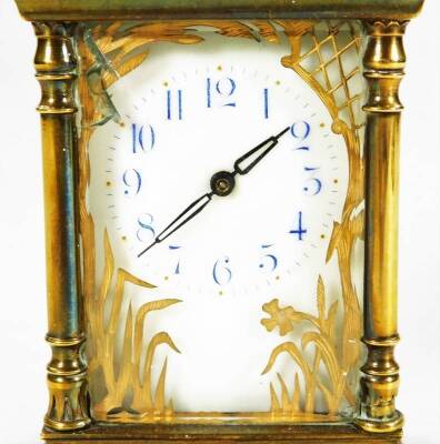 A late 19thC brass carriage clock, with ivory coloured 6cm W dial with Arabic numerals, stencilled with gilt flowers and revealing a twin train keywind movement, in a five part glazed case, on compressed orb feet, flanked by quarter columns, surmounted by - 2