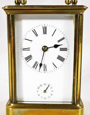 A late 19thC brass alarm carriage clock, the 5.5cm dial with Roman numerals and subsidiary Arabic second hand, revealing a twin train movement with bell, partially jewelled, in a five part glazed case, on shaped feet, 12cm H. - 2