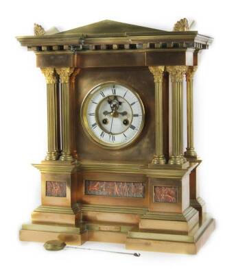 A 19thC exhibition quality J W Benson mantel clock, with Royal links, the 12cm Dia. Roman numeric dial marked J W Benson, with exposed cog work revealing the 8-day movement, in a Neo Classical polished bronze case, with brass additions, an inverted front