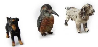 Three 19thC Austrian cold painted figures, comprising of a kingfisher, 4cm H, spaniel and black and tan terrier, unmarked. (3)