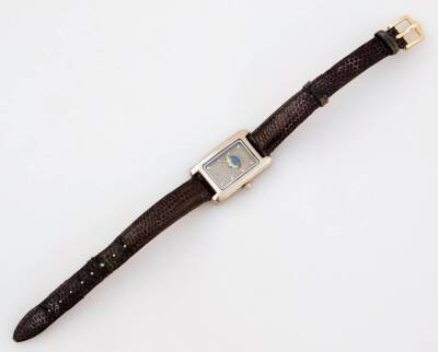 A Cartier gentleman's wristwatch, with rectangular cut silvered dial, with date aperture, and lunar arch and stars dial, bezel wind, marked to rear no. 8103728, in silver backing stamped 925, on a thin brown leather strap, mark to clasp H Plus. - 3