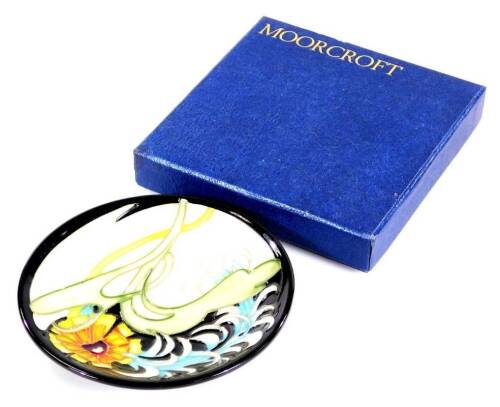 A Moorcroft Collectors Club Plume pattern coaster, marked beneath, 12cm Dia. (boxed)