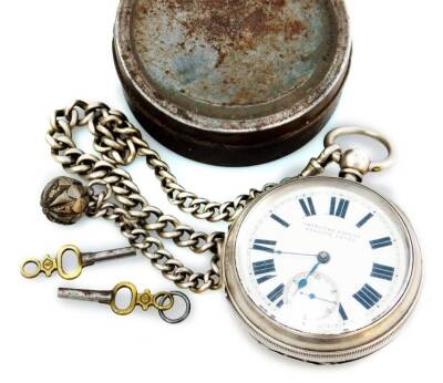 A silver pocket watch and chain, the watch with 4cm dia. face marked English Lever, with Roman numeric dial in a part engine turned case, with a jewelled backplate, numbered 536360, with silver chain.