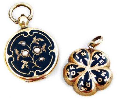 Two Victorian memorial pendants, one with design of five leaf flower, on black enamel marked In Memory Of, with memorial panel to back, Victorian bloomed gold, the other a locket, with black enamel and seed pearl decoration to front, with etched design ba