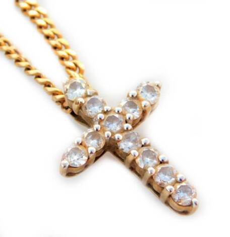 A 9ct gold cross pendant and chain, the cross pendant set with cz stones, on a curb link chain, 7.5g