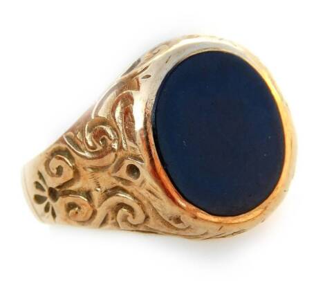 A 9ct gold signet ring, with oval black agate stone, with C & S-scroll design shoulders, on a later plain band, 5g all in.