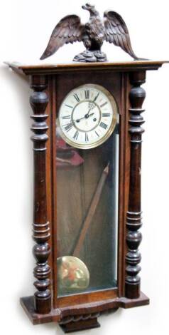 A 19thC walnut and beech cased German wall clock, with 8-day movement and later eagle mount, 83cm H.