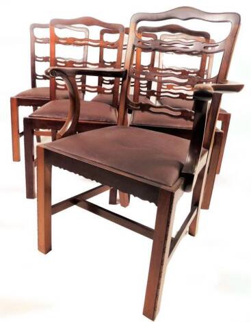 A set of six mahogany dining chairs, to include one carver, each with shaped top rails, pierced horizontal splats, and drop in seats, on block legs, joined by H stretchers, 96cm H, etc. (6)