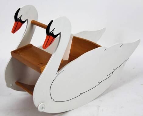 A child's swan rocking chair, with pine seat, 58cm H.