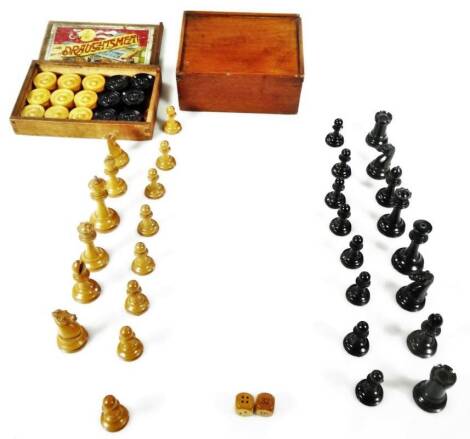 An early 20thC Staunton pattern part chess set, the white king 8cm H in case (AF) and a Draughtsman Globe Series draughts set in case with a draw leaf top.