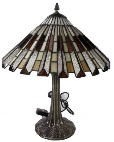 An as new table lamp, with Tiffany style Art Deco design shade, predominately in orange and cream, 55cm H.