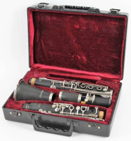 A Blessing four piece clarinet, in fitted case, 31cm W.