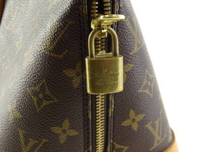 A Louis Vuitton monogram canvas Alma bag, with leather handle and base, brass branded padlock and keys etc. - 2