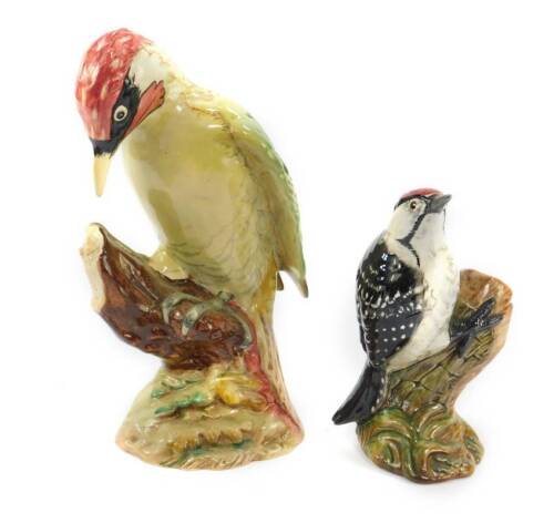 A Beswick figure modelled as a green woodpecker, No.1218, impressed marks, together with a lesser spotted woodpecker, 2420, printed marks. (2)