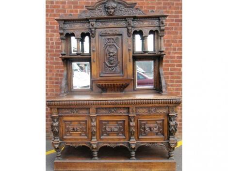 A late 19th early 20thC carved oak dresser