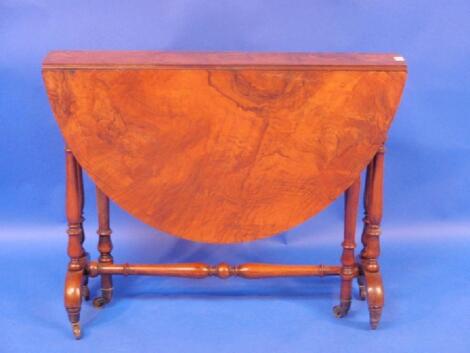 A Victorian figured walnut Sutherland table