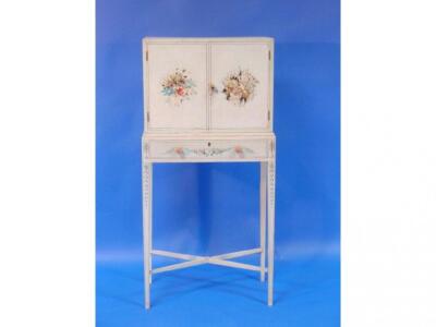 A floral painted cabinet on stand with two doors fitted with a mirrored - 2