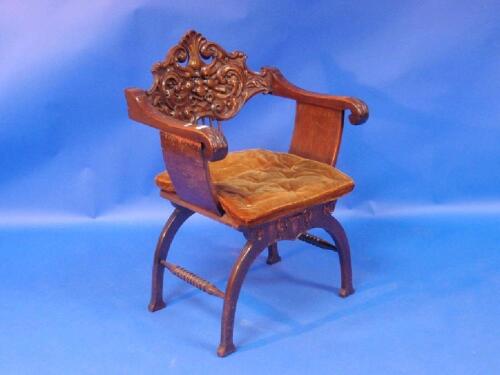 A walnut Savonorla chair with loose squab