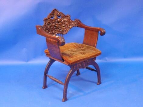 A walnut Savonorla chair with loose squab