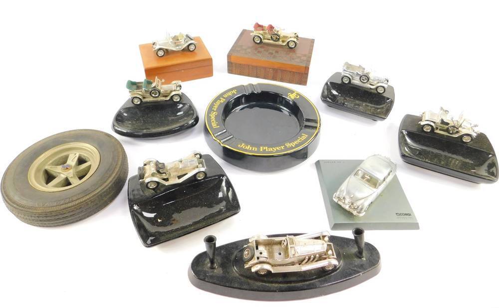 Lesney die cast vehicle mounted ashtrays, two boxes, pen stand, Jaguar