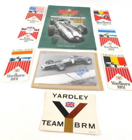 A photograph of a BRM No 6 racing car from the German Grand Prix 1966, driven by Jackie Stewart, 3rd position, with autograph, BRM Day brochure, and Marlborough BRM 1970's stickers. (qty)