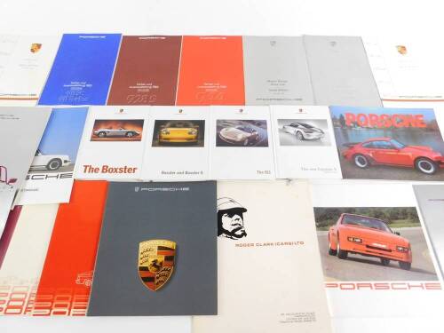 Porsche promotional books on The Cayman, Boxster and 911 cars, price lists and brochures. (qty)