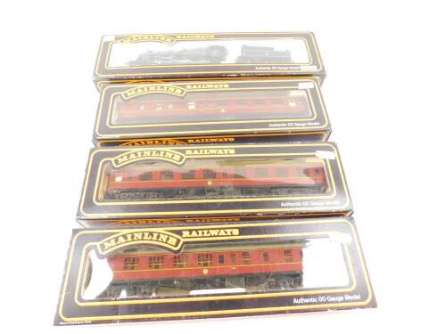 An Airfix OO gauge diesel locomotive, BR green livery, A1A-A1A class 31, 54101-9, together with Airfix Palitoy and Dapol tank locomotives and three Palitoy mainline railway coaches, BR red livery, all boxed (7)