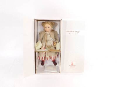 A Schneider porcelain doll modelled as Myriam, limited edition, boxed with certificate.