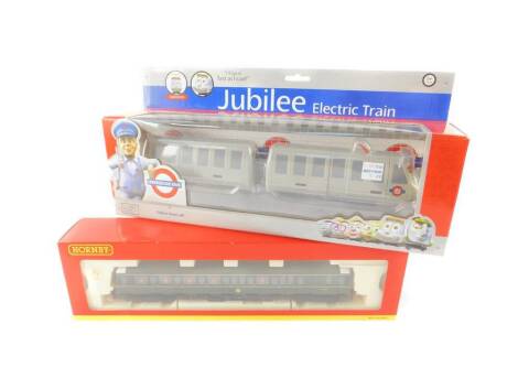 A Hornby OO gauge driving motor brake coach, Class 121, W55032, R2509A, together with a Jubilee Electric Train Underground Ernie, both boxed. (2)