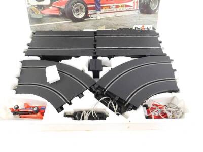 A Polistil Champion 175 world racing system, boxed, together with further track and a racing book (4) - 2