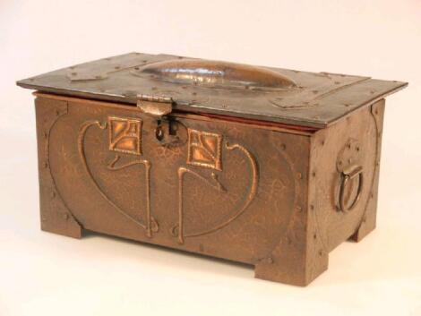 An Arts & Crafts beaten copper casket