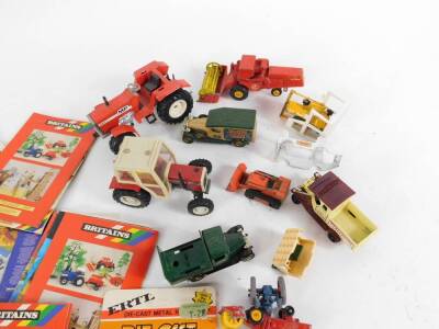 ERTL die cast models of tractors, further tractors and die cast farm machinery, Britains and other toy catalogues. (qty) - 2