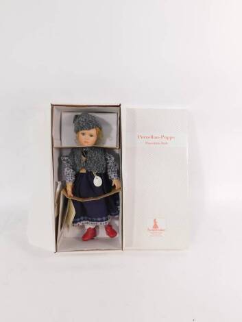 A Schneider porcelain doll modelled as Beata, limited edition, boxed with certificate.