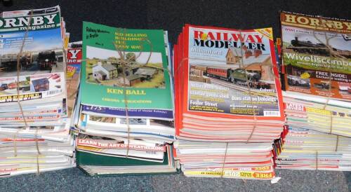 Hornby and Railway Modeller Magazine, Continental Modeller, together with books and videos on railways. (qty)