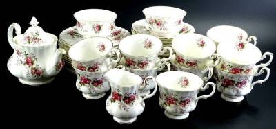 A Royal Albert Lavender Rose pattern part tea service, to include a small teapot and cover.