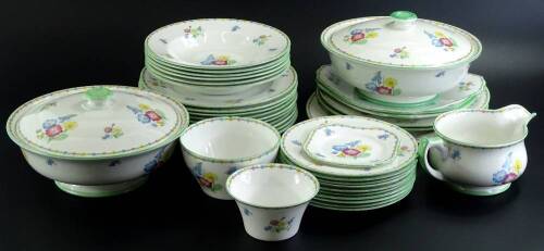 A Shelley floral pattern part dinner set, decorated with clusters of flowers, printed mark in green to underside, registration number 823343 and 781613, various factory marks to underside.