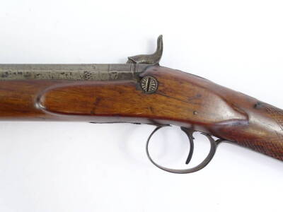 A late 19thC muzzle loading shotgun, with single barrel, ram rod and partly engraved plate (no maker) and walnut stock, 120cm L. - 2