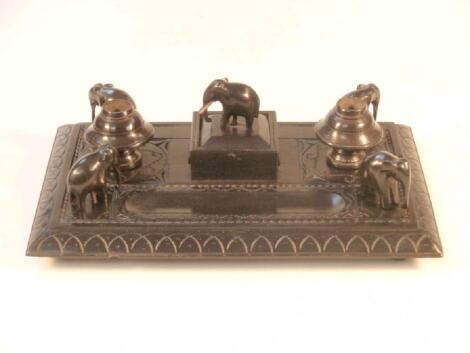 An early 20thC Indian ebony desk stand