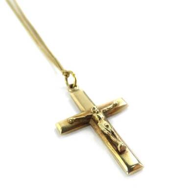 A 9ct gold crucifix pendant, with figure of Jesus, 2.3cm H, on fine link 9ct gold chain, 4.1g all in.