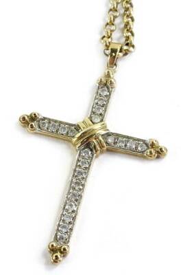 A 9ct gold cross pendant and chain, the cross set with imitation white stones, with gold edging and centre, on belcher chain, also marked 9ct, 5.4g all in, the pendant 4cm H.