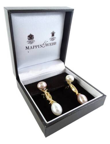 A pair of 18ct gold South Sea pearl set drop earrings, the top pink coloured pearl, set in white metal setting, with an 18ct gold drop, set with tiny diamonds with makers stamp S.W, and a white design pearl drop, the other earring the pearls are the oppos