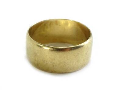 A 9ct gold thick wedding band, ring size R½, 5.7g all in.