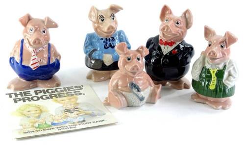 A set of five Wade Natwest pigs, ranging from baby through to grandad, sold with original Natwest 'The Piggies Progress' leaflet.