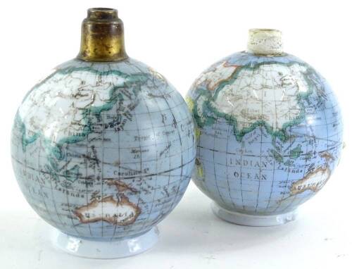 A pair of German opaque glass scent bottles, each with printed decoration in the form of a globe (AF), 12cm H.