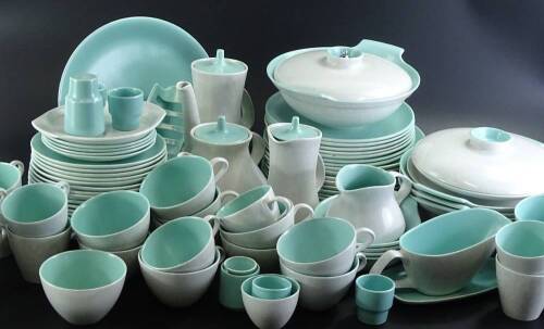 A large quantity of Poole grey and turquoise two tone dinner ware, to include coffee pot, teapot, toast rack, cups and saucers, dinner plates etc.