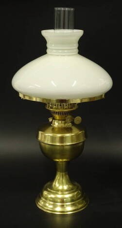 A Veritas Duplex brass oil lamp, with opaque white glass shade and clear glass chimney, 55cm H.