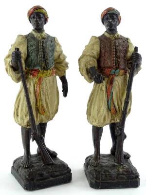 A pair of late 19thC continental spelter Blackamoor figures, each modelled in the form of an Arab soldier, later painted, 23.5cm H.