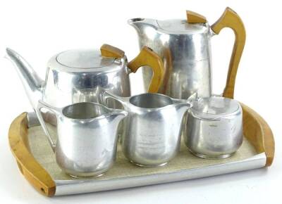 A Picquot ware aluminium five piece tea set with tray, 38cm W.