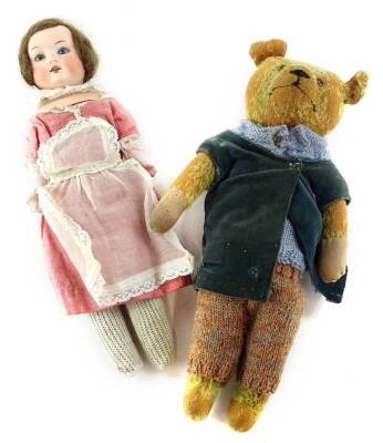 A German bisque headed doll, no makers stamp but stamped 11/0, with porcelain arms and a vintage small teddy bear, 29cm L.
